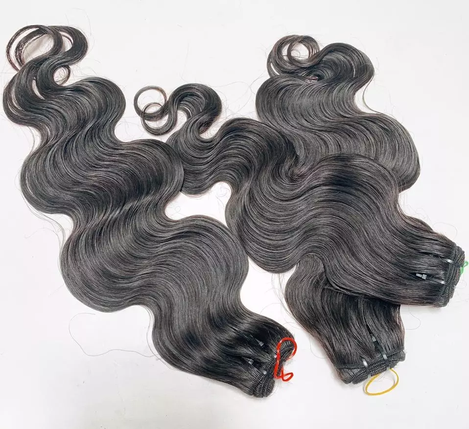 Bulk wholesale price of human virgin extension hair from once donor