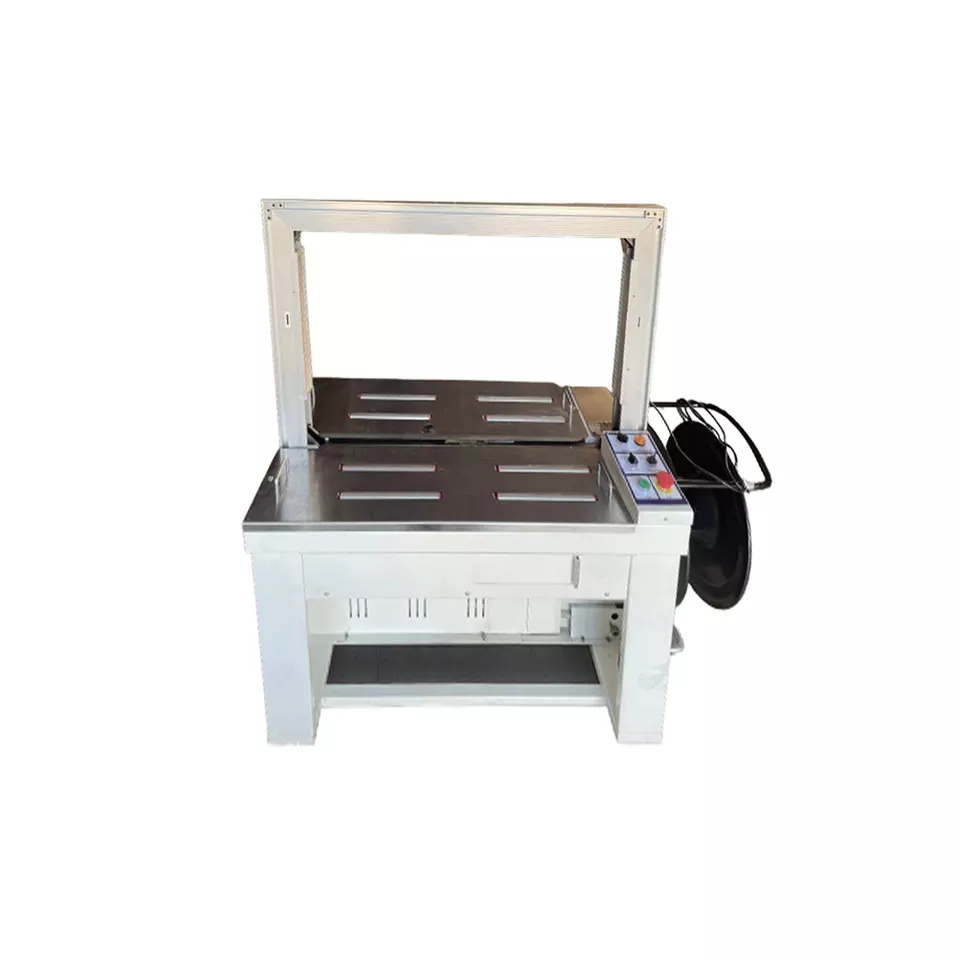 Semi-Automatic Strapping machine for wrapping strap band roll with international quality ready to ship and fast delivery