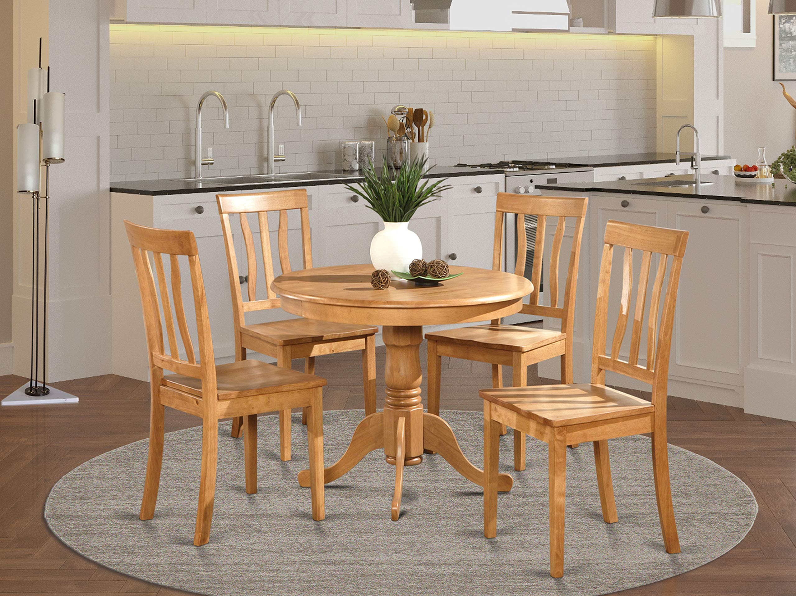 Oak dining table with 4 modern chairs
